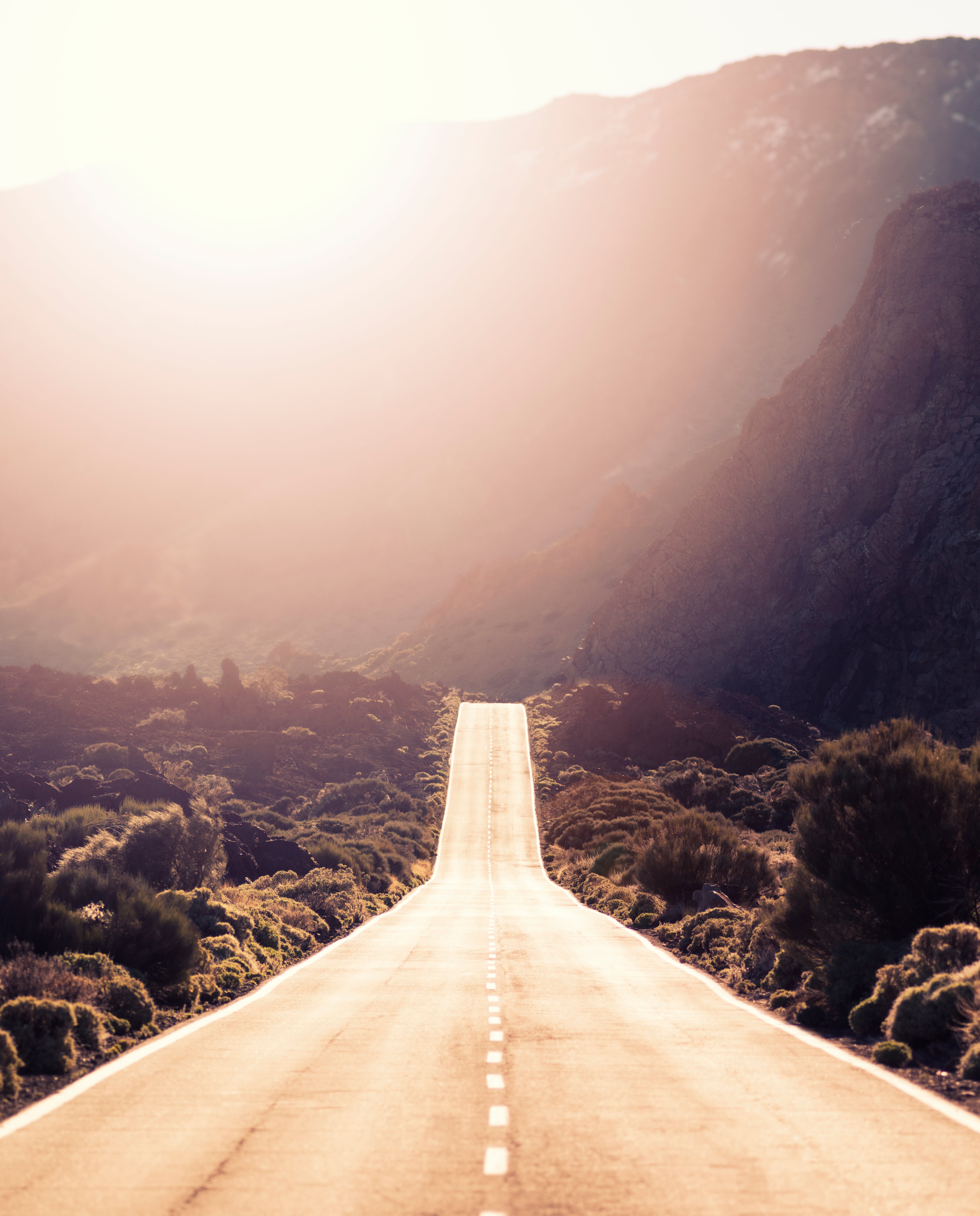 Road leading into mountainous landscape