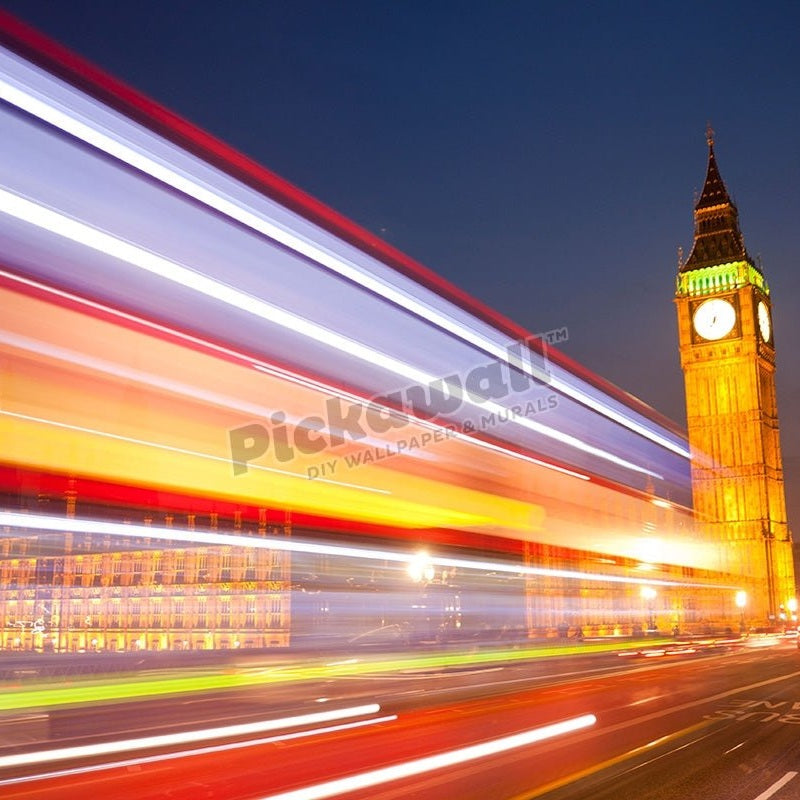 Big Ben Clock Tower Houses of Parliament at night with blurred lights of passing red London bus in foreground London England UK - Pickawall