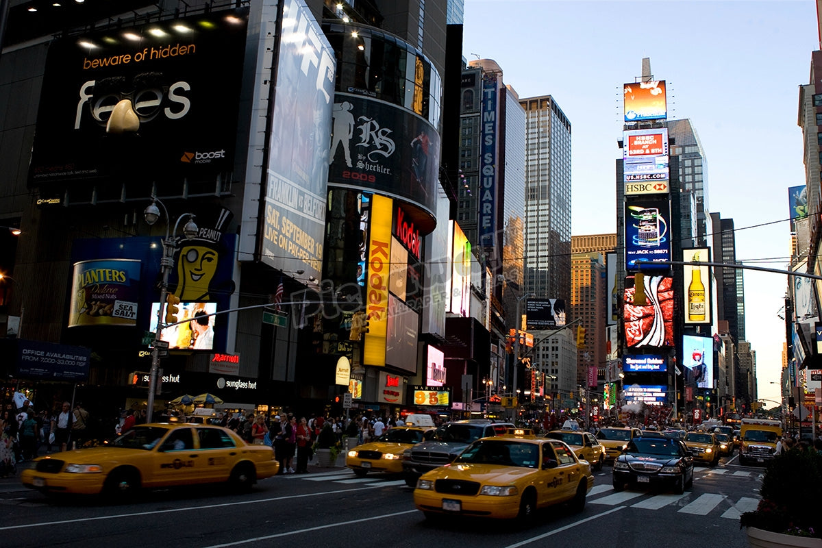 Traffic driving passed Time Square