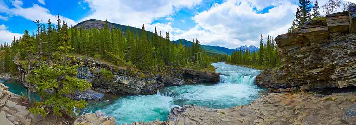 Falls rushing through rocky landscape
