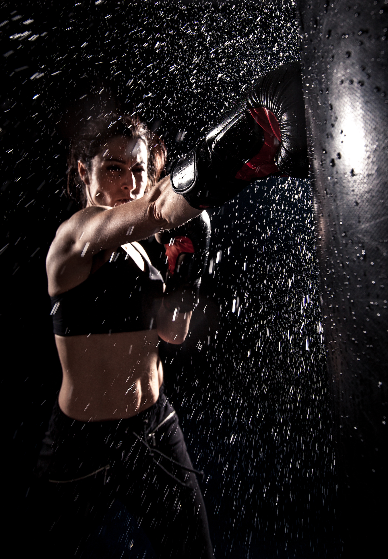 woman boxing at the punching bag