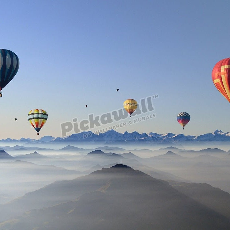 Hot air balloons over mountain skyline - Pickawall