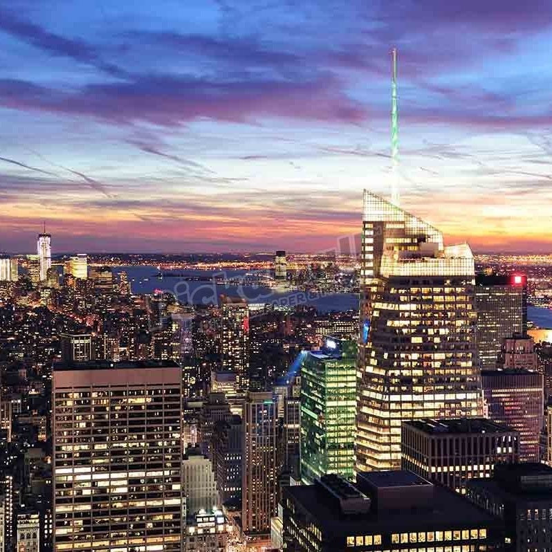 New York City skyline with urban skyscrapers at sunset. - Pickawall