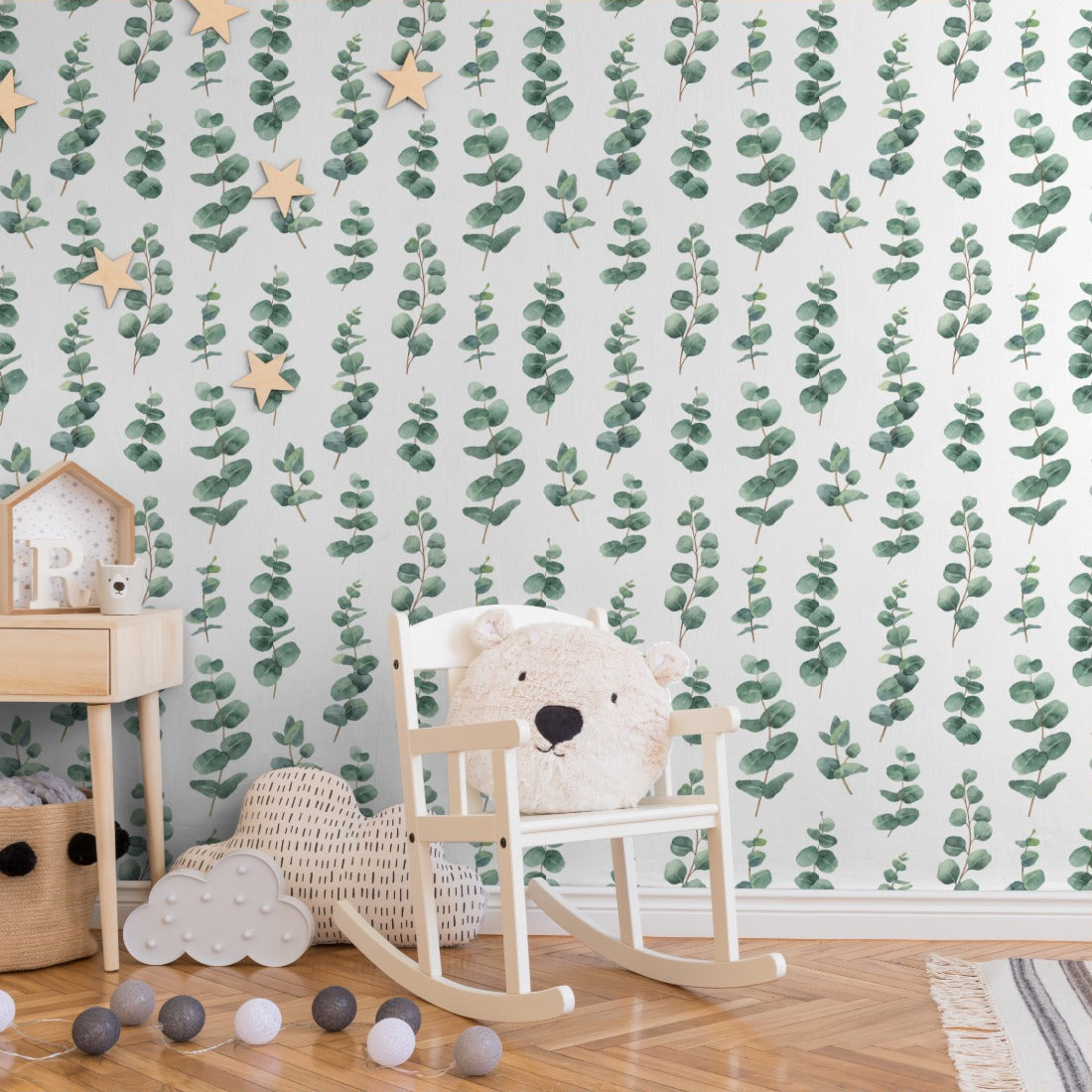 Watercolour silver dollar eucalyptus leaves wallpaper in a nursery - Pickawall