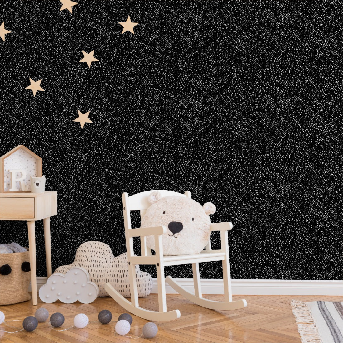 Black with white dots background wallpaper in a nursery - Pickawall