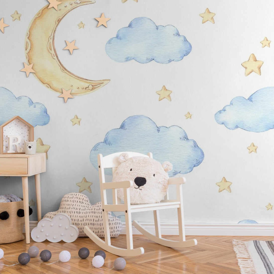 Watercolour Moon and Stars wallpaper in a nursery - Pickawall