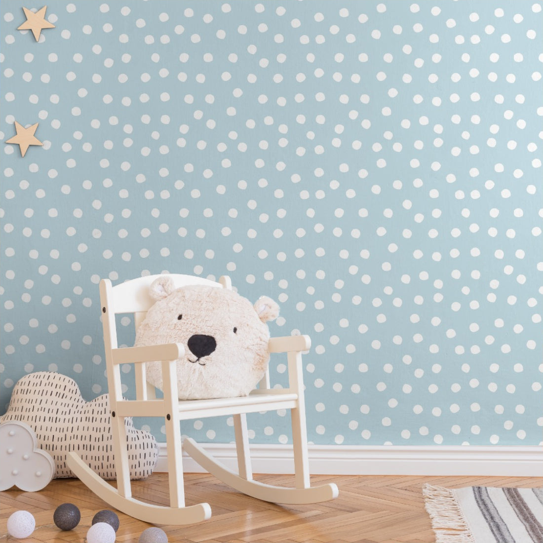 White spots on a blue background wallpaper in a nursery - Pickawall