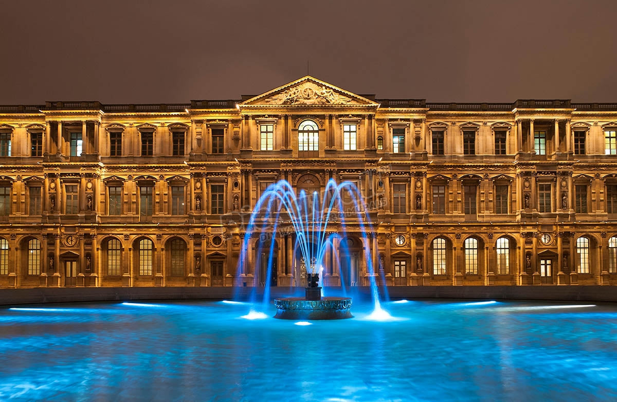 The Louvre museum at night, Paris, France