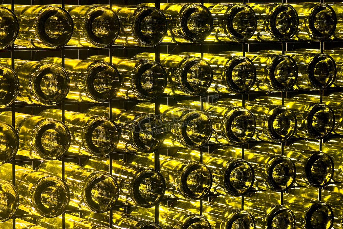 Wall made of recycled glass wine bottles