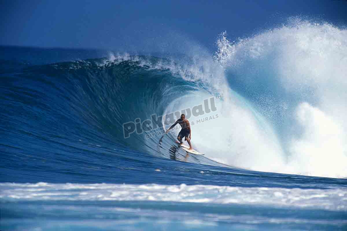 Kelly Slater surfing in a tube at Backdoor Pipeline.