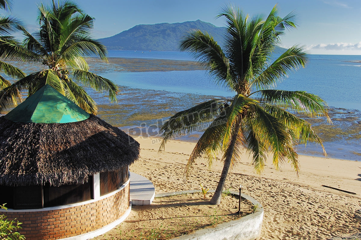 Panoramic view of a cottage at the beach