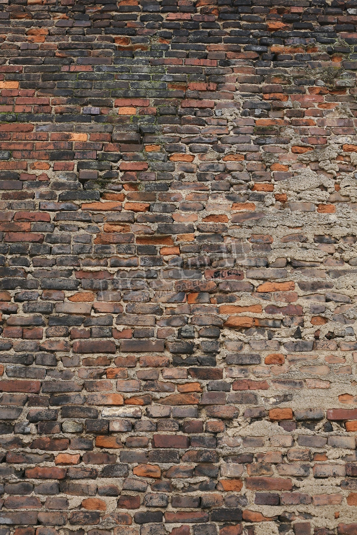 Very old, worn and crumbling brick wall