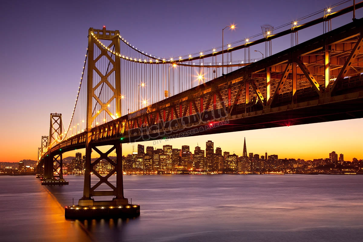 Twilight at the Oakland Bay Bridge with skyline of San Francisco beyond, California USA