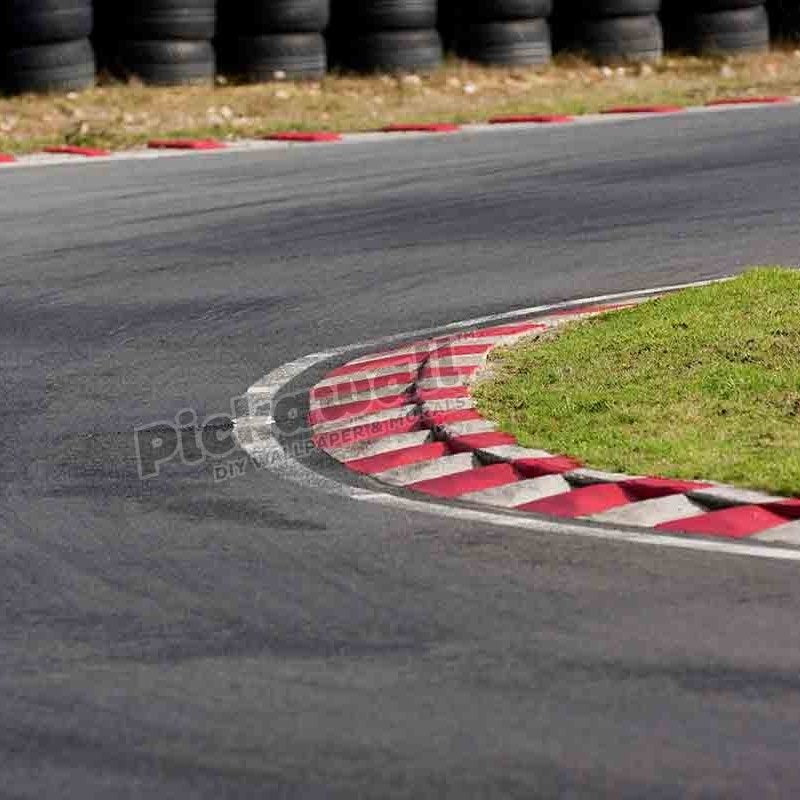 An empty bend on a race car circuit - Pickawall