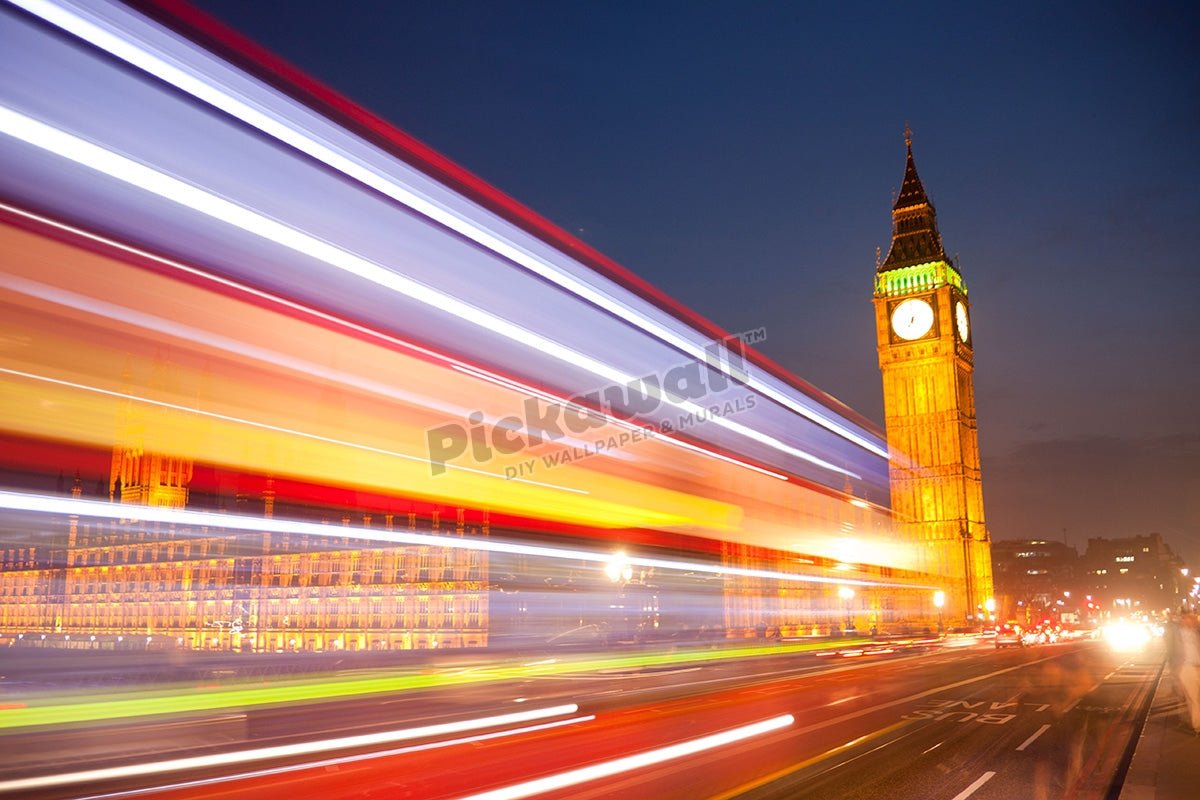 Big Ben Clock Tower Houses of Parliament at night with blurred lights of passing red London bus in foreground London England UK - Pickawall