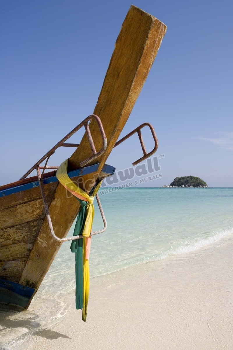 Bow of traditional longtail boat with cloth to appease sea spirits. - Pickawall