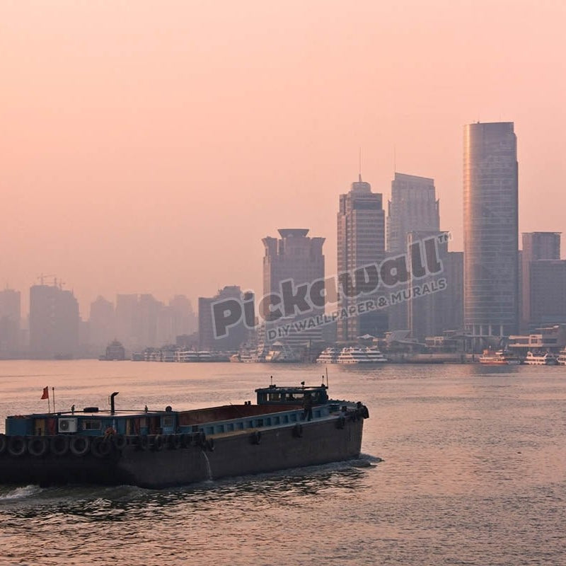 Buildings along Huangpu River and barge at sunrise, Shanghai, China - Pickawall