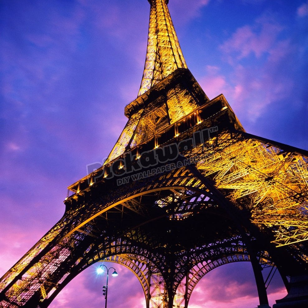 Eiffel Tower illuminated at night - Pickawall