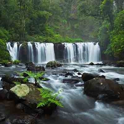Nandroya Falls in Wooroonooran National Park. Atherton Tablelands, Innisfail, Queensland, Australia - Pickawall